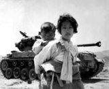 The Korean War (25 June 1950 - armistice signed 27 July 1953) was a military conflict between the Republic of Korea, supported by the United Nations, and North Korea, supported by the People's Republic of China (PRC), with military material aid from the Soviet Union. The war was a result of the physical division of Korea by an agreement of the victorious Allies at the conclusion of the Pacific War at the end of World War II.<br/><br/>

The Korean peninsula was ruled by Japan from 1910 until the end of World War II. Following the surrender of Japan in 1945, American administrators divided the peninsula along the 38th Parallel, with United States troops occupying the southern part and Soviet troops occupying the northern part. The failure to hold free elections throughout the Korean Peninsula in 1948 deepened the division between the two sides, and the North established a Communist government. The situation escalated into open warfare when North Korean forces invaded South Korea on 25 June 1950. It was the first significant armed conflict of the Cold War.<br/><br/>

The United Nations, particularly the United States, came to the aid of South Korea in repelling the invasion. A rapid UN counter-offensive drove the North Koreans past the 38th Parallel and almost to the Yalu River, and the People's Republic of China (PRC) entered the war on the side of the North. The Chinese launched a counter-offensive that pushed the United Nations forces back across the 38th Parallel.<br/><br/>

The Soviet Union materially aided the North Korean and Chinese armies. In 1953, the war ceased with an armistice that restored the border between the Koreas near the 38th Parallel and created the Korean Demilitarized Zone (DMZ), a 2.5-mile (4.0 km) wide buffer zone between the two Koreas. Minor outbreaks of fighting continue to the present day.